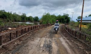 Penyiringan Jalan Kuala Lupak Ditarget Rampung Desember