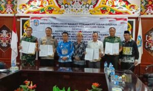 Penandatangan NPHD dalam rangka Penyelanggaraan Pilkada di Murung Raya