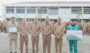 Bupati Batola Serahkan Hibah Rp3 Miliar untuk KONI